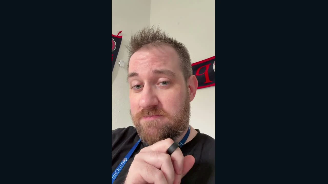 Lorenzo demonstrating the ring used to control his AI by voice